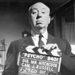 Alfred hitchcock holding a slat for psycho